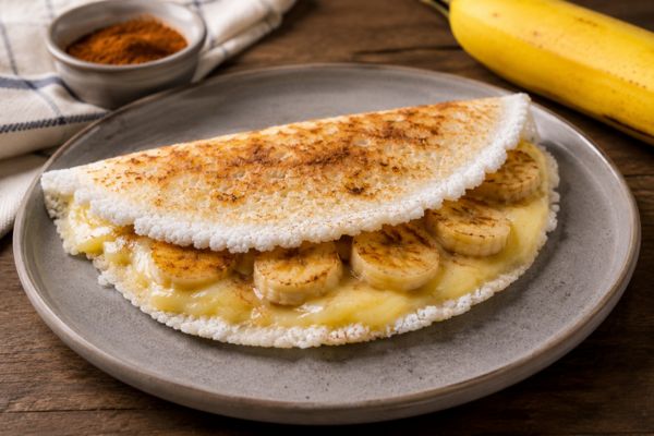 Tapioca com banana e queijo gratinado: a receita saudável que fica dourada e irresistível 2 Tapioca com banana e queijo gratinado.